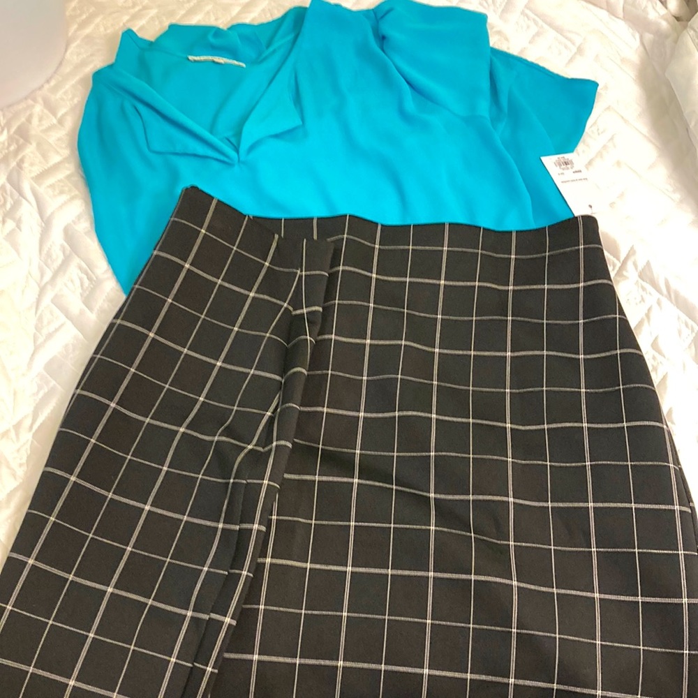 NWT.Evri knee length black with white window pane plaid.